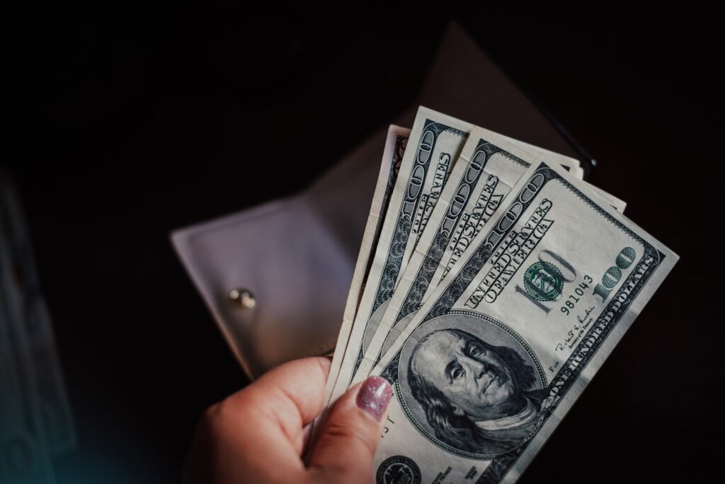 economy concept, money distribution. Wallet with money